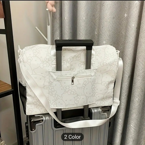 Sanrio Hello Kitty travel bag. Color: White with grey Hello Kitty designs throug - Picture 2 of 13